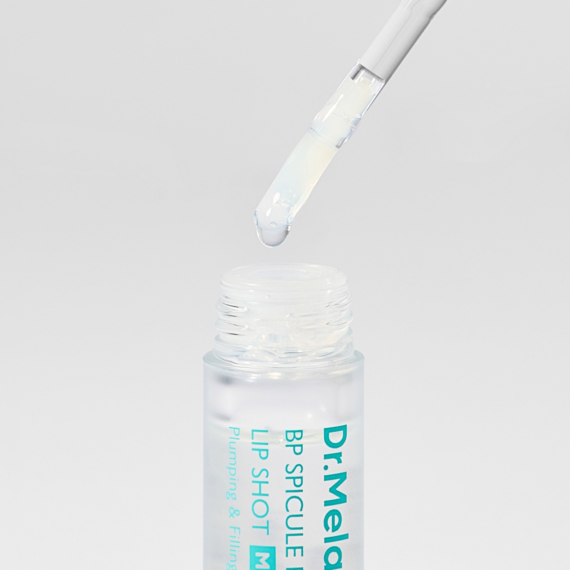 DR.MELAXIN BIO-SPICULE BP SPICULE PLUMPING LIP SHOT MILD Nawilżający błyszczyk do ust z delikatnym efektem powiększenia 4 ml #4
